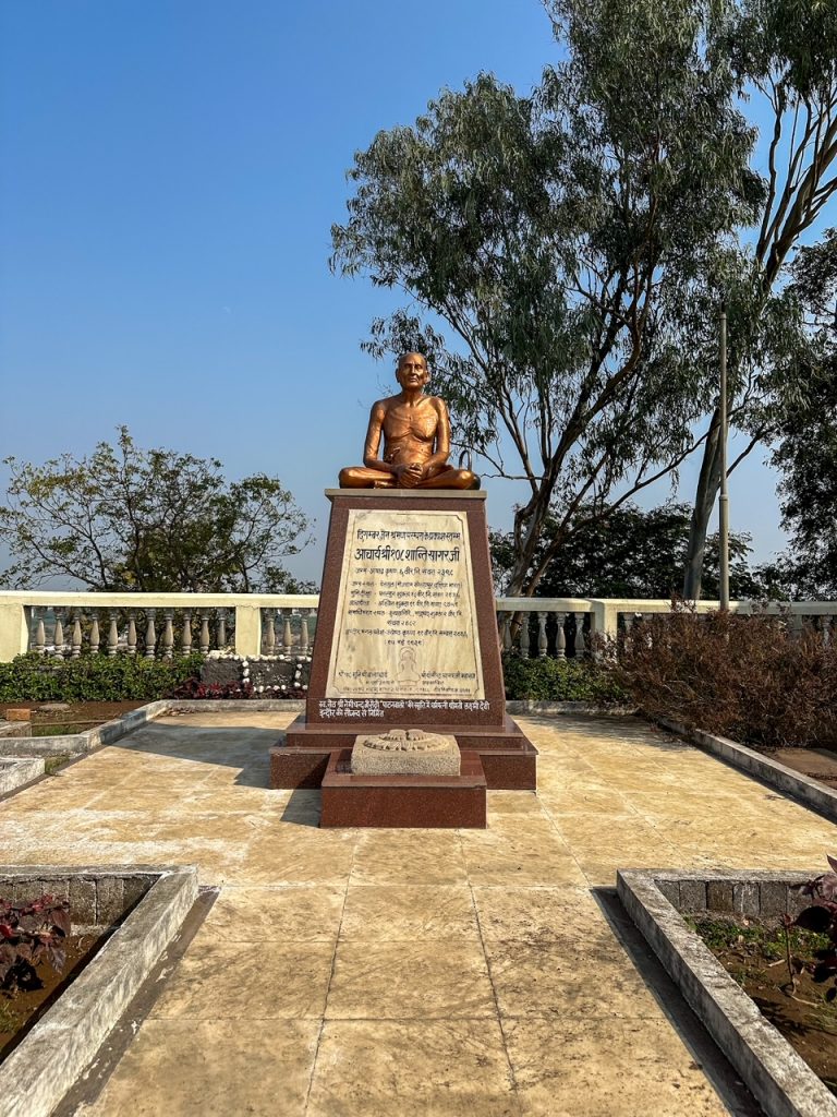 a statue at Gomatgiri