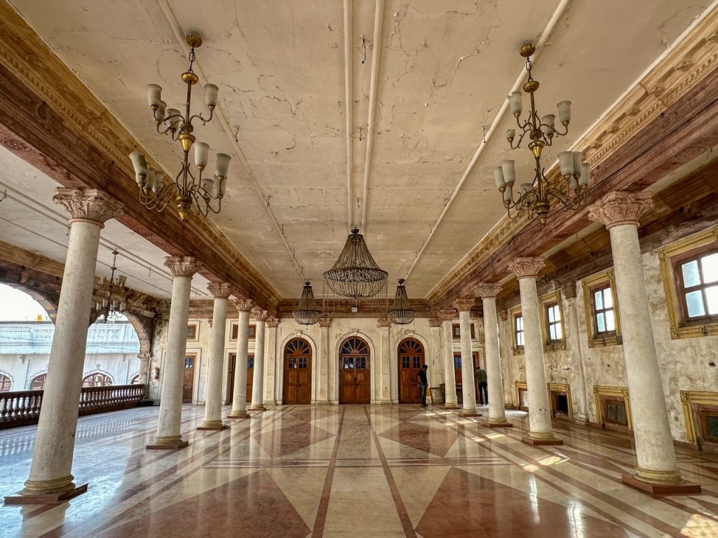 inside the ornate Rajwada Palace in Indore