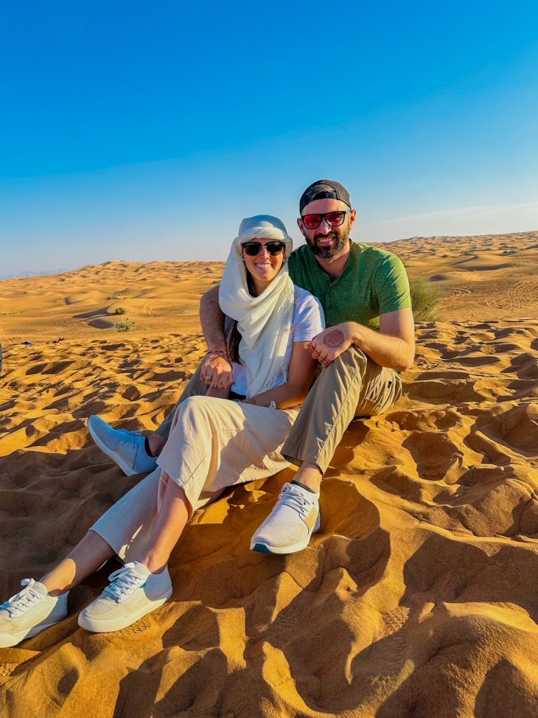 Sara & Tim enjoying the red dunes in Dubai