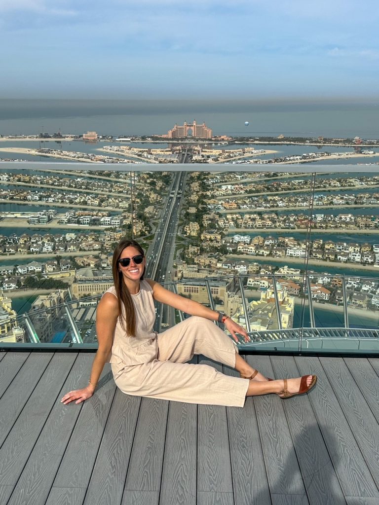 Sara sitting at The Next Level at The View at the Palm, one of the best things to do in Dubai