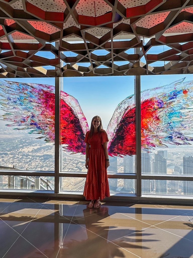 Sara with the wings at At The Top Burj Khalifa in Dubai