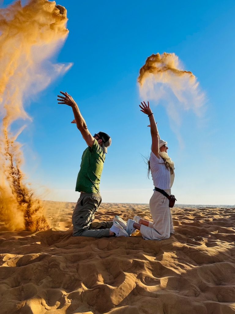 Tim & Sara on their Dubai desert safari, one of the top things to do in Dubai