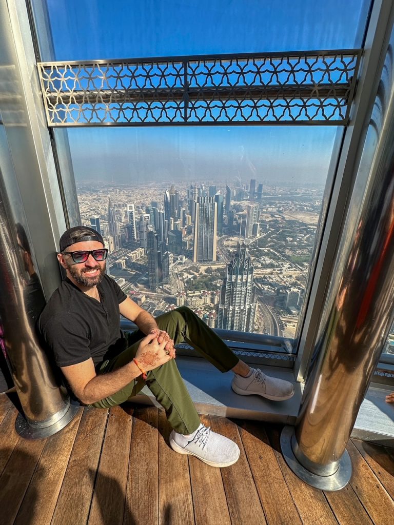Tim in front of the view at At The Top Burj Khalifa