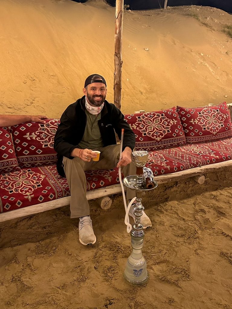 Tim smoking Shisha in the Dubai Desert