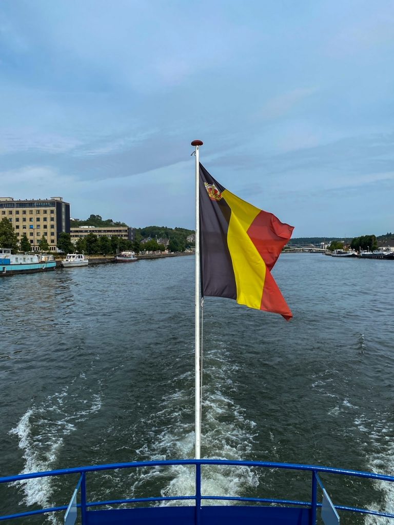 the Belgian flag on our Meuse-Ardennes boat tour in Namur, Belgium