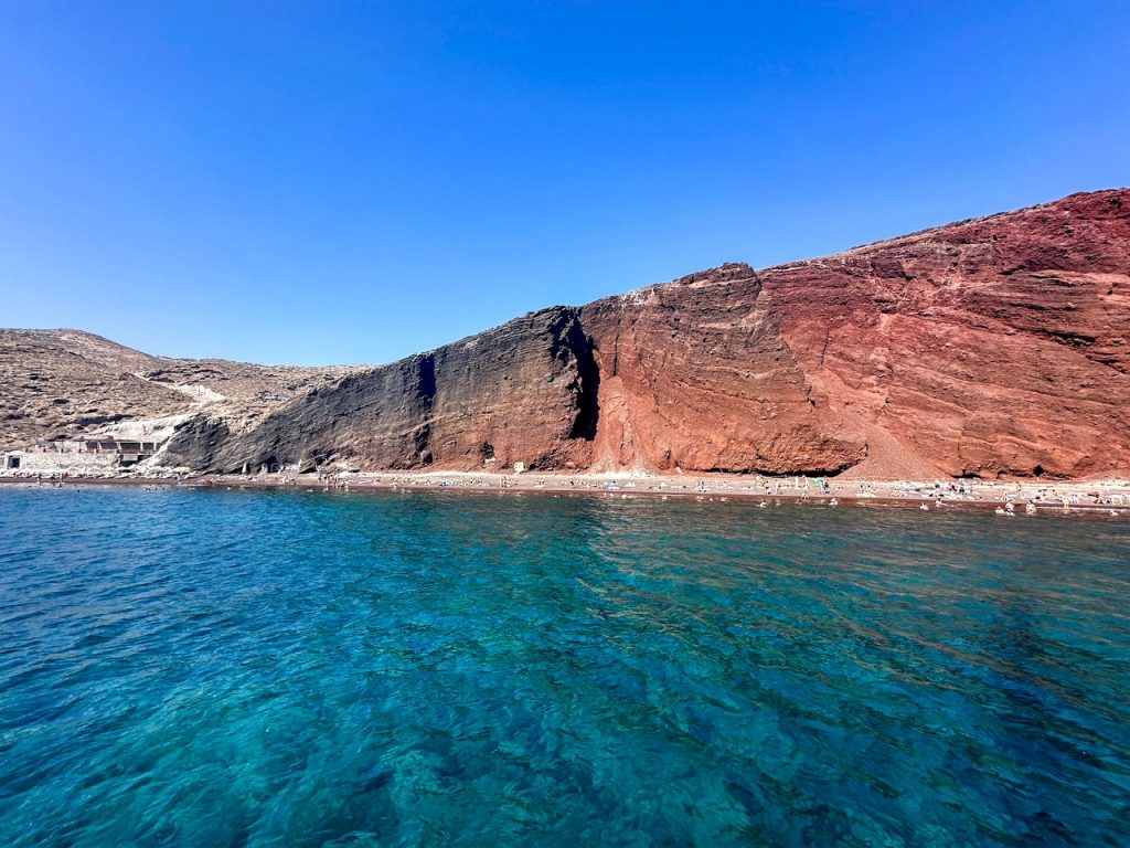 the stunning Red Beach as seen from our Santorini catamaran cruise