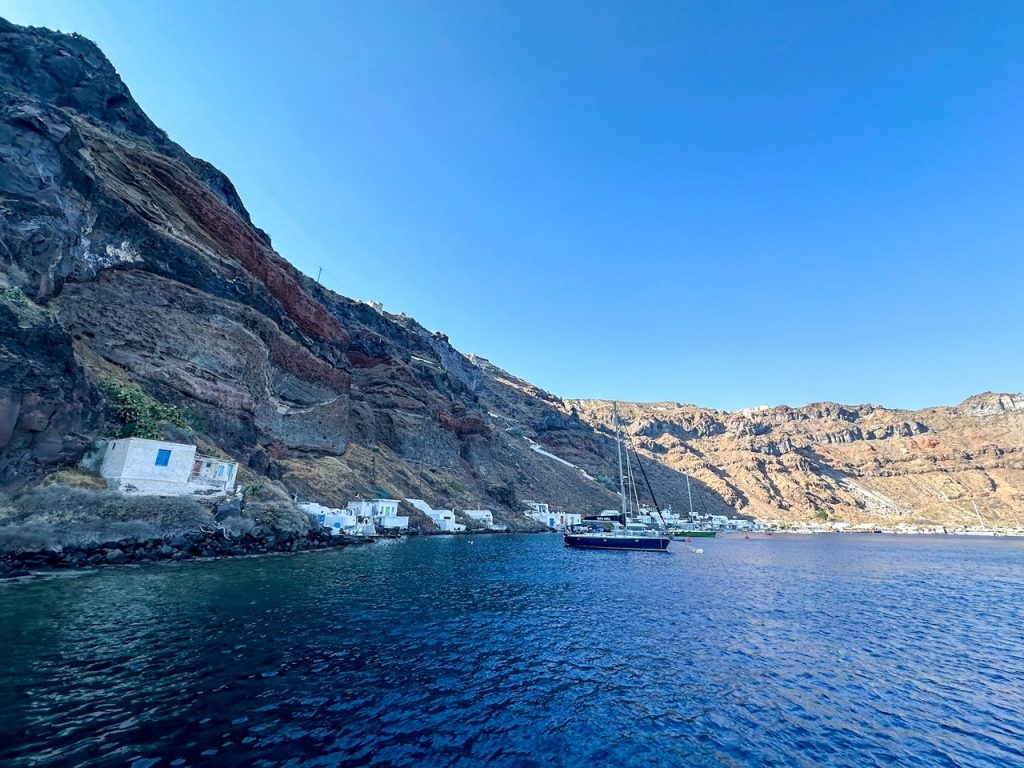 a small village in Greece as seen from our Santorini catamaran cruise