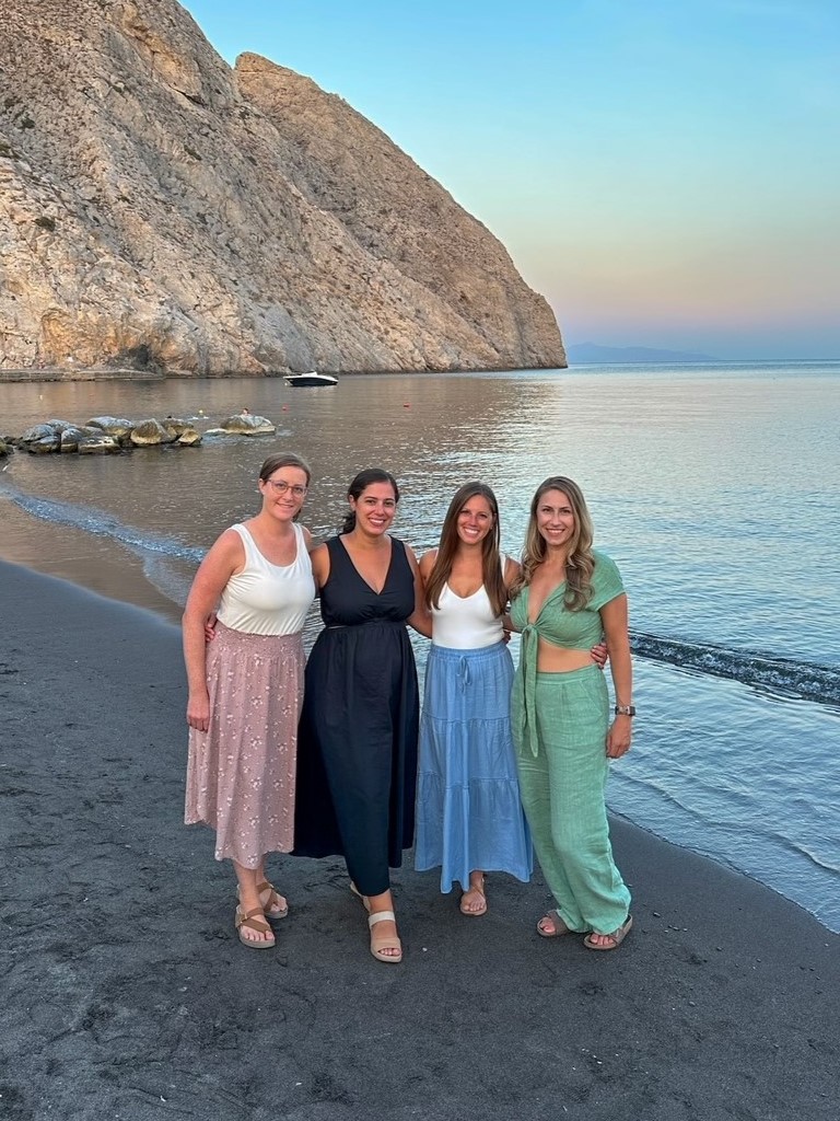 the girls on Perissa Beach in Santorini