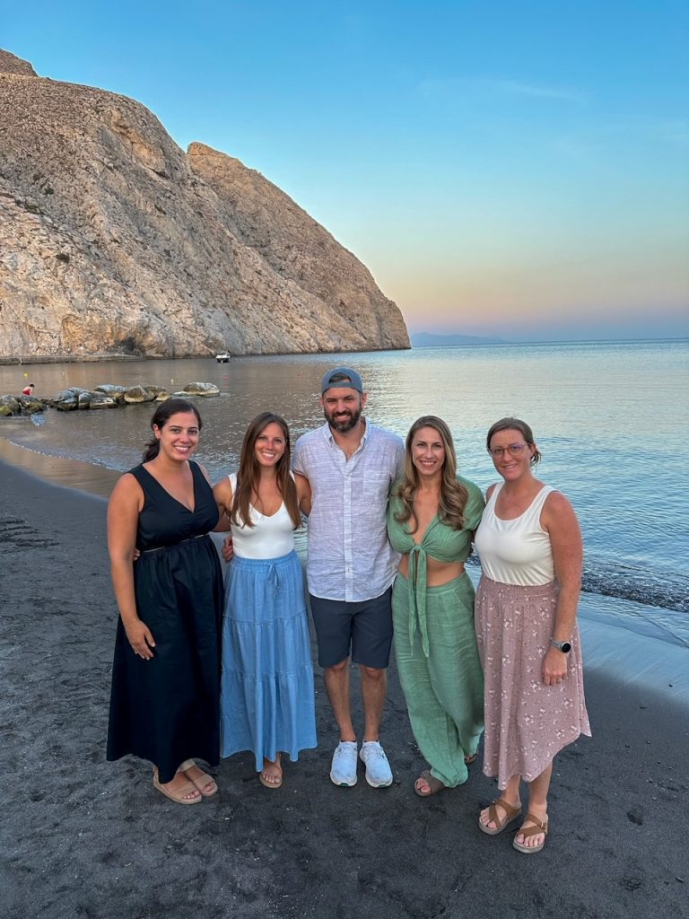 the group on Perissa Beach on the island of Santorini