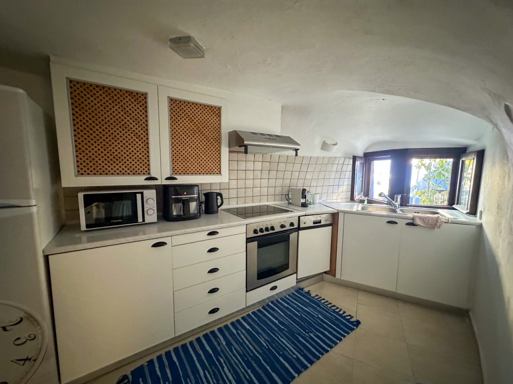 the kitchen at Anedosa Cave House in Santorini