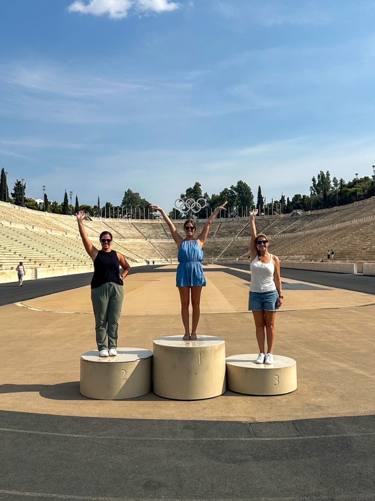 the girls saluting at the Panathenaic Stadium