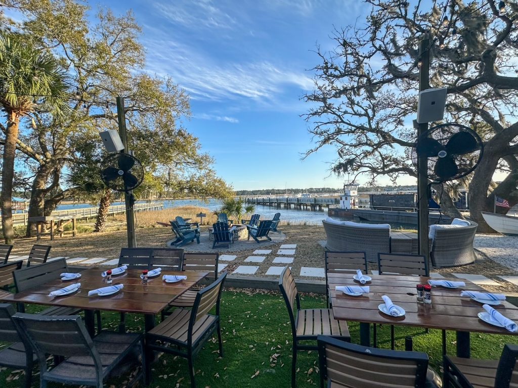 the outdoor dining space at Fishcamp on Broad Creek in Hilton Head