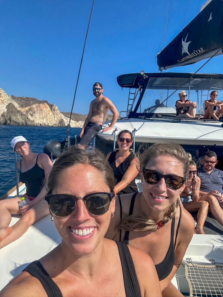 a selfie of all five of us on our Santorini catamaran cruise