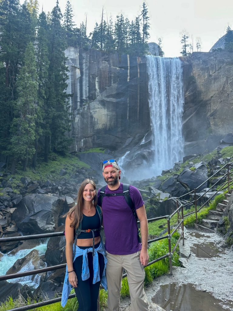 Sara and Tim in front of a gushing Vernal Fall in Yosemite in June