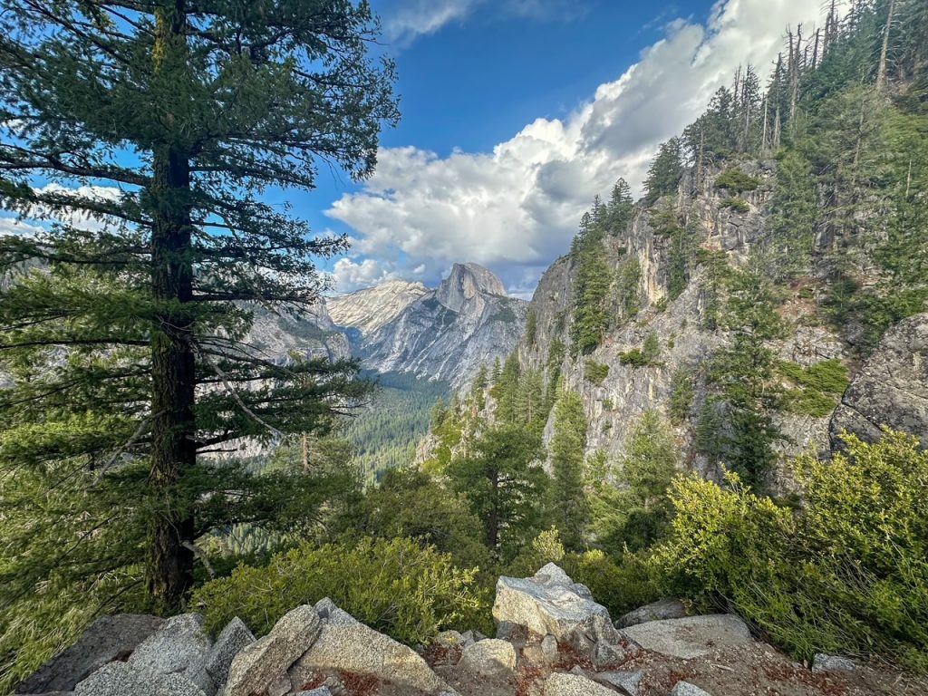 a gorgeous view of Half Dome in the afternoon light from the Four Mile Trail in Yosemite