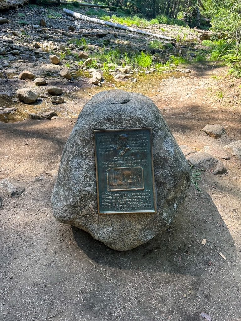 a rock with an inscription about John Muir at the Lower Yosemite Fall Viewpoint