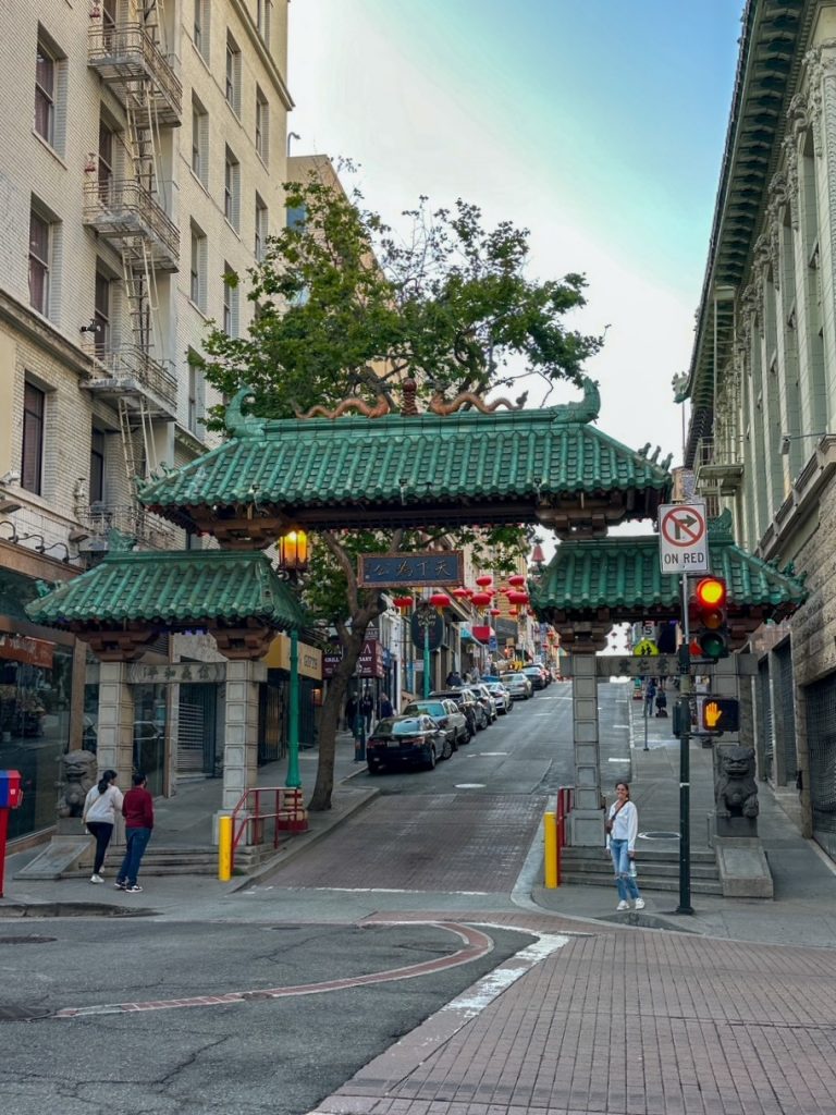 Sara in front of Tian Xia Wei Gong in Chinatown in San Francisco