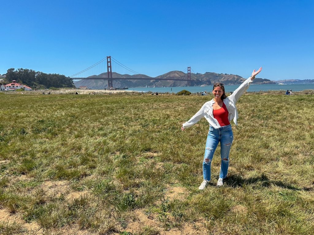 Sara presenting the Golden Gate Bridge at Crissy Field in San Francisco
