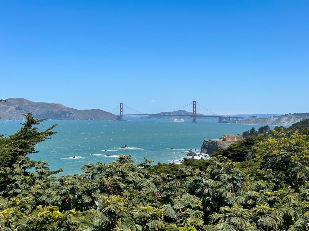 View of the Golden Gate Bridge from the Lands End Trail in San Francisco, a top California road trip stop