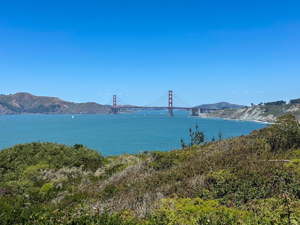 the Golden Gate Bridge as seen from the Lands End Trail on a clear day in San Francisco