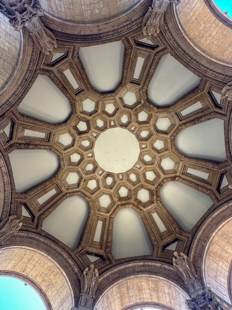 the intricately designed ceiling at the Palace of Fine Arts in San Francisco