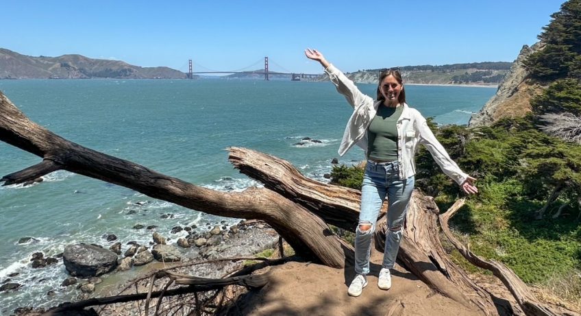 Sara presenting the iconic Golden Gate Bridge on the Lands End Trail in San Francisco
