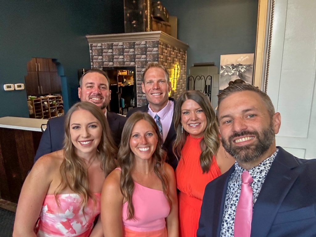 Friends taking a selfie at the hotel before a vineyard wedding in Petaluma, California