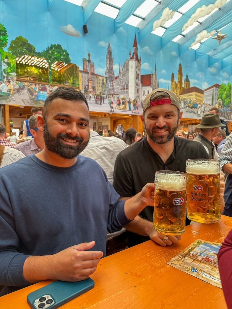 Boys with their beer steins inside the Hacker-Pschorr Festzelt tent at Oktoberfest in Munich