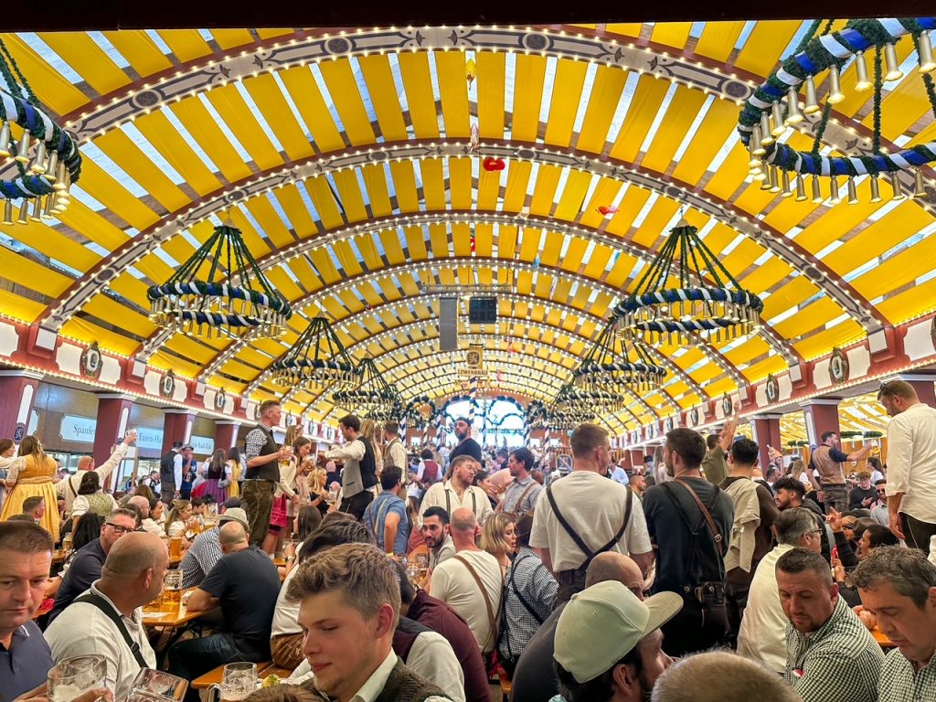 Decor and crowds inside Lowenbrau-Festzelt at Oktoberfest in Munich beer tent