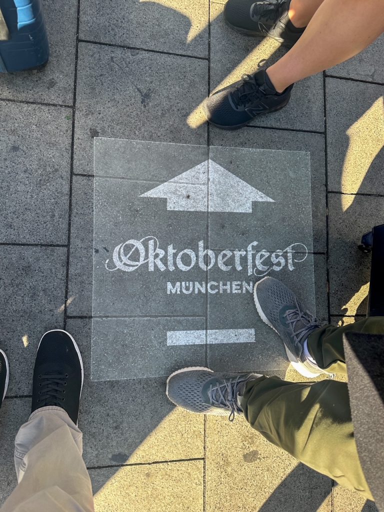 Oktoberfest directions on the sidewalk in Munich