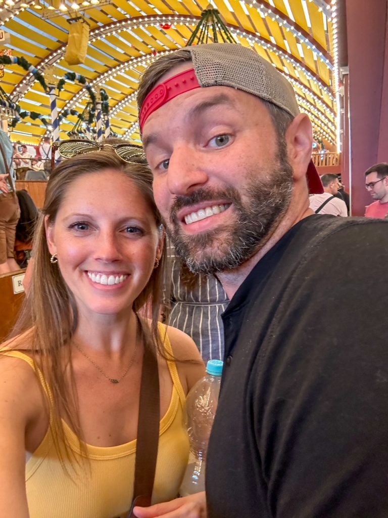 Sara and Tim taking a selfie inside the Lowenbrau-Festzelt tent at Oktoberfest in Munich