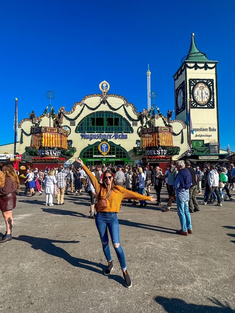 Sara posing in front of Augustiner Brau at Oktoberfest in Munich