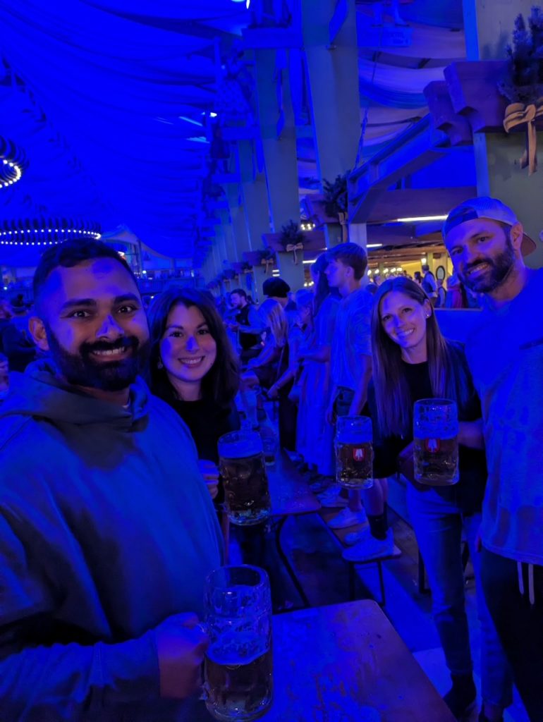 Group of friends at Oktoberfest in Munich at night