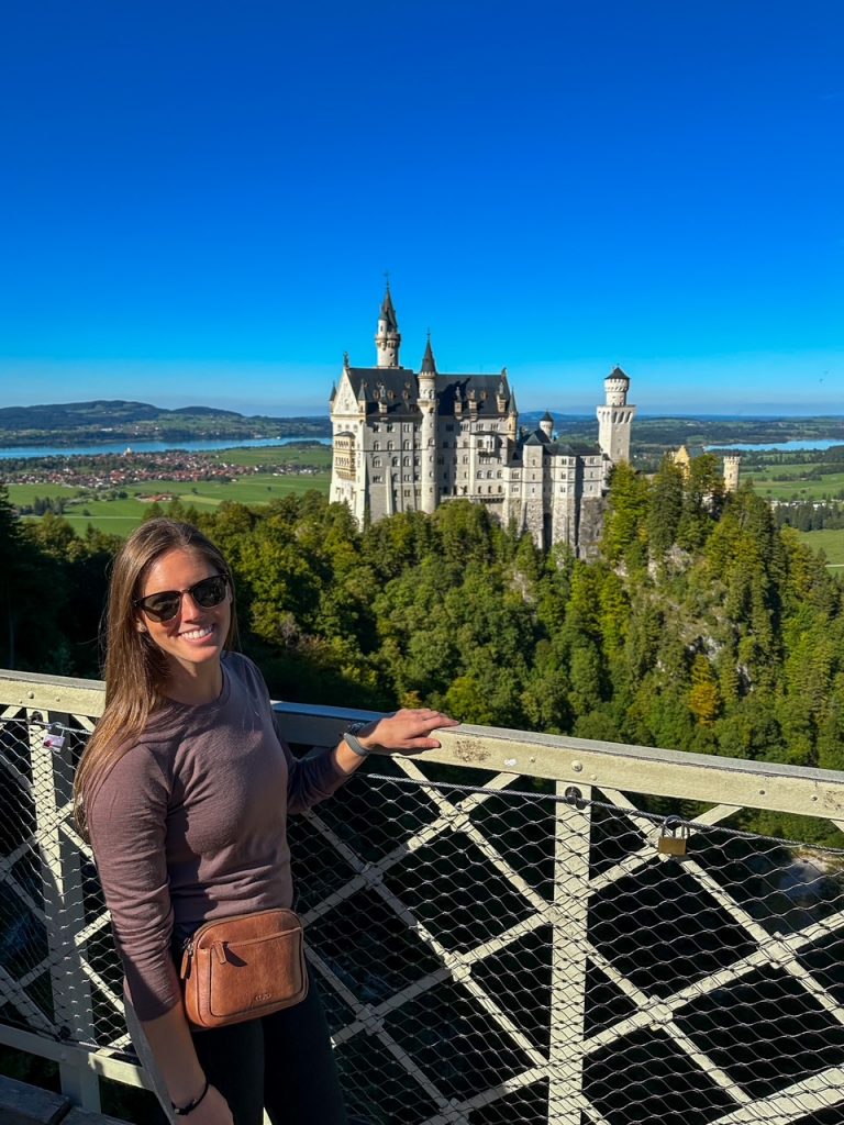 Sara at Queen Mary's Bridge with Neuschwanstein Castle in the background