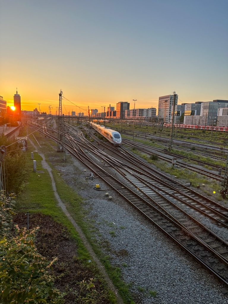 Train coming into Munich at sunset