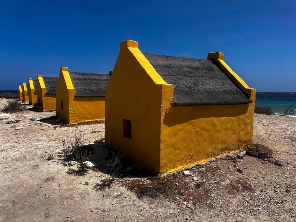 Historic yellow slave huts in Bonaire