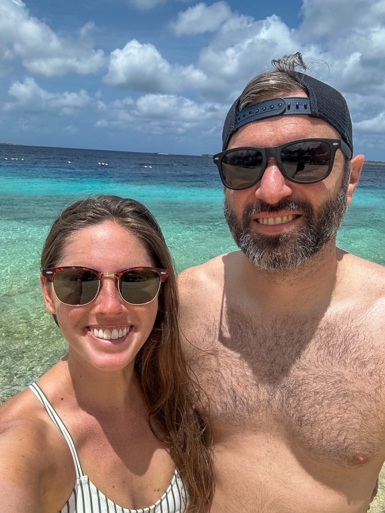 Sara and Tim on the private beach at Harbour Village Beach Club in Bonaire