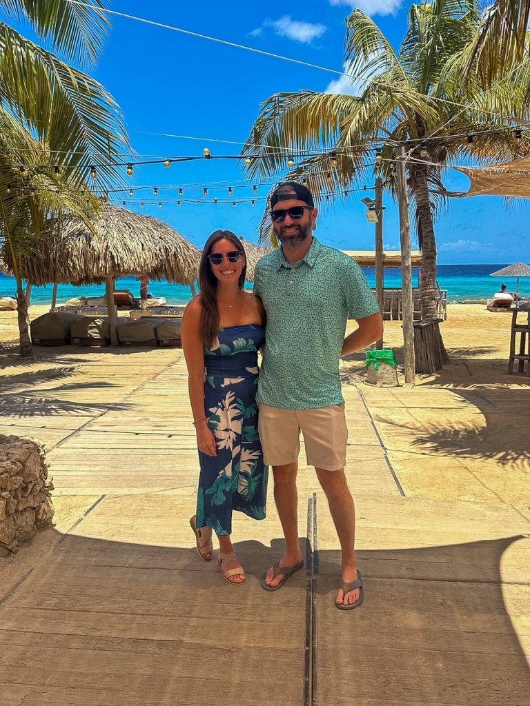 Tim and Sara wearing her jumpsuit at Ocean Oasis Beach Club in Bonaire