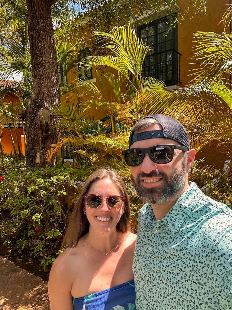 Sara and Tim outside their room at Harbour Village Beach Club