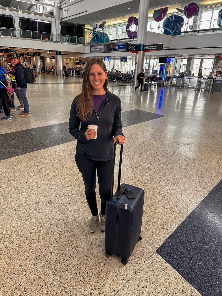 Sara with luggage at George Bush Intercontinental Airport in Houston