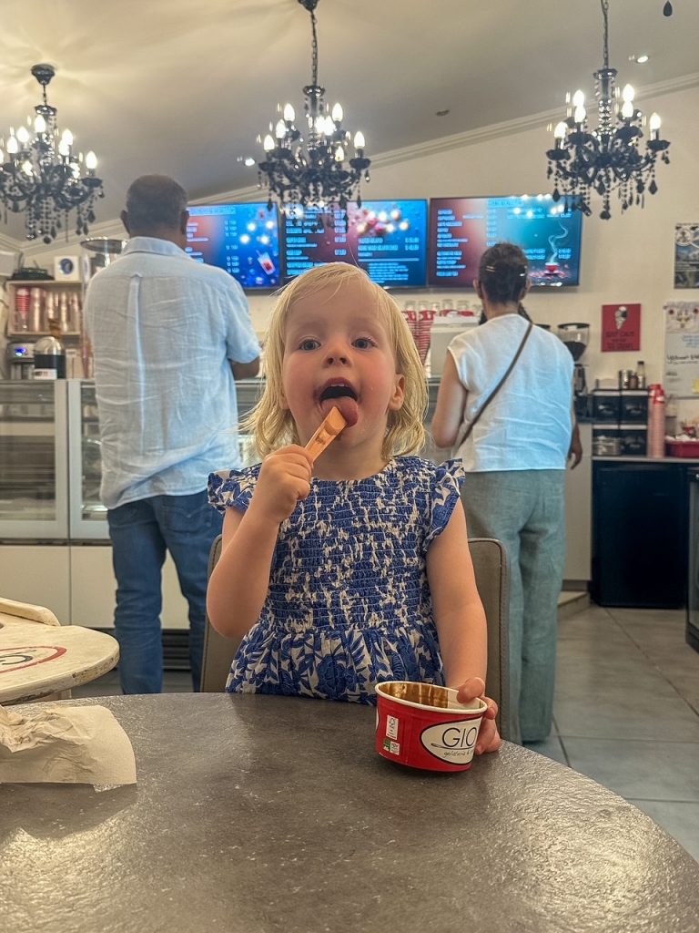 Toddler eating gelato at Gios in Bonaire