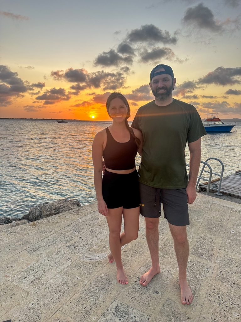 Sara and Tim after sunset yoga at Harbour Village Beach Club Bonaire