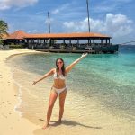 Sara on the beach at Harbour Village Bonaire
