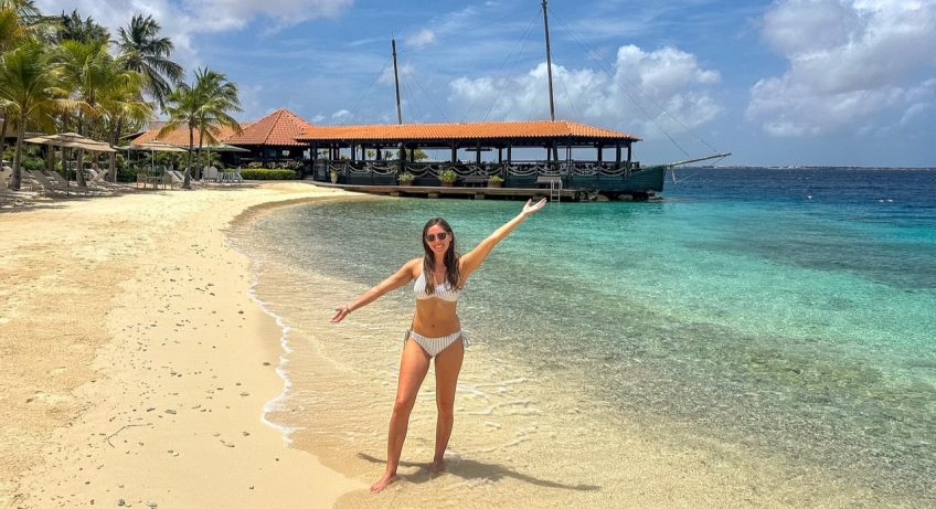 Sara on the beach at Harbour Village Bonaire