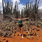 Sara with large cacti on the Lagadishi Trail Bonaire