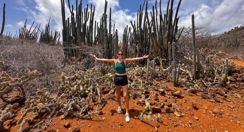 Sara with large cacti on the Lagadishi Trail Bonaire